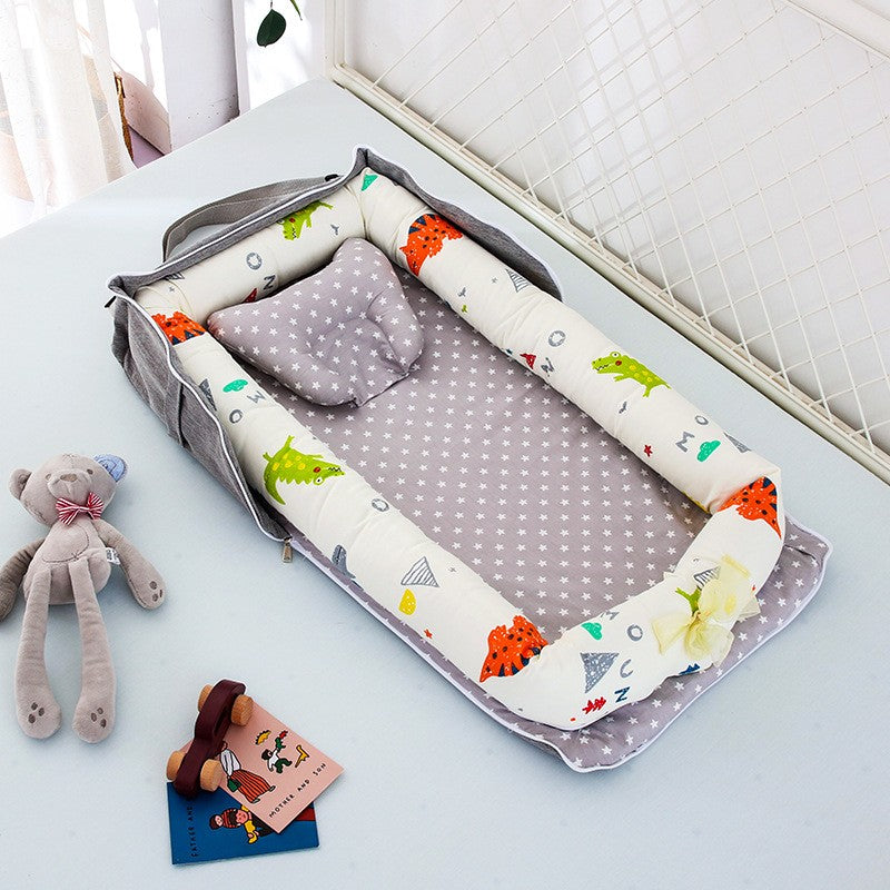 matelas-a-langer-portable-dinosaure-rouge