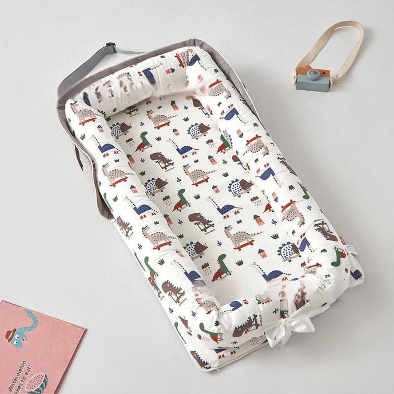 matelas-a-langer-portable-dinosaure-vert