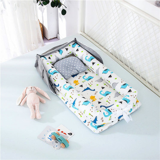 matelas-a-langer-portable-dinosaure-bleu